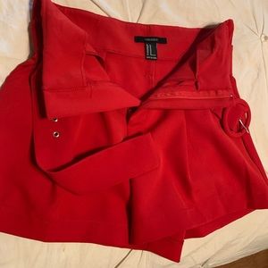 red shorts